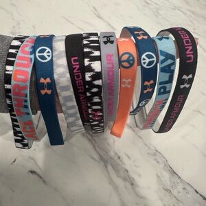 Under Armour Girls' Blue, Orange, Pink and Black Elastic Headband Set. 11 total